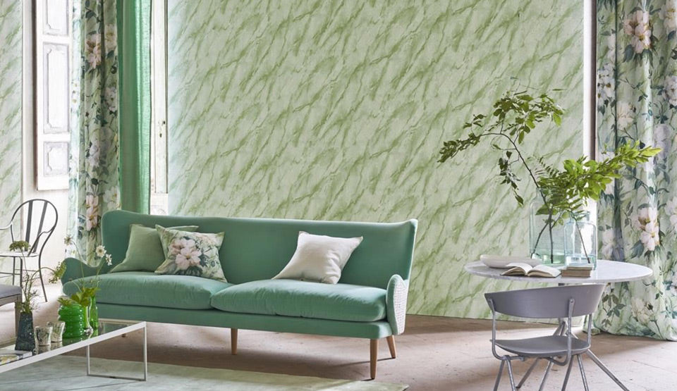 Designers Guild Green Wallpaper with Couch and Pillows